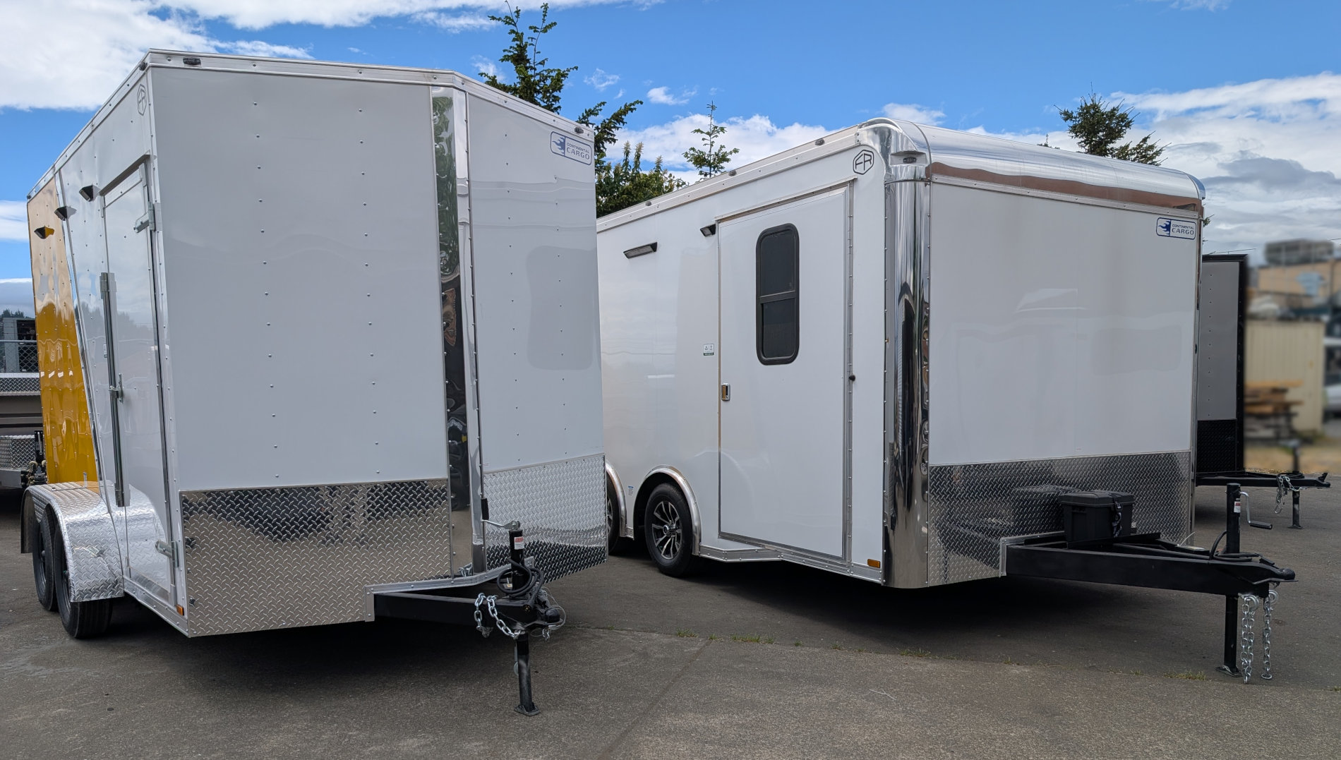 custom-camping-trailer-modifications-cargo-conversion-thomcat-lot Custom camping trailers that were converted from enclosed cargo trailers at Thomcat Westshore.
